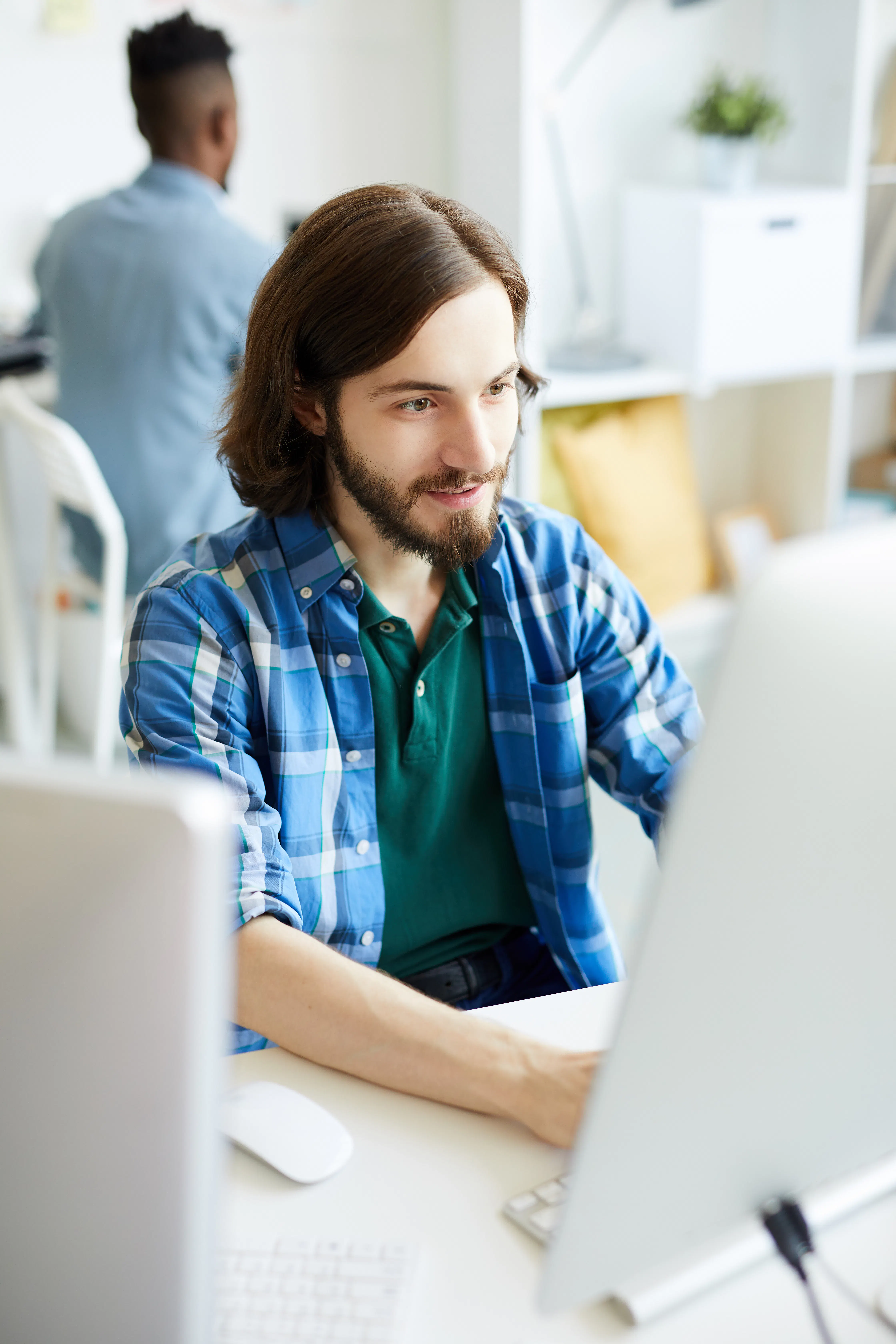 man working at laptop