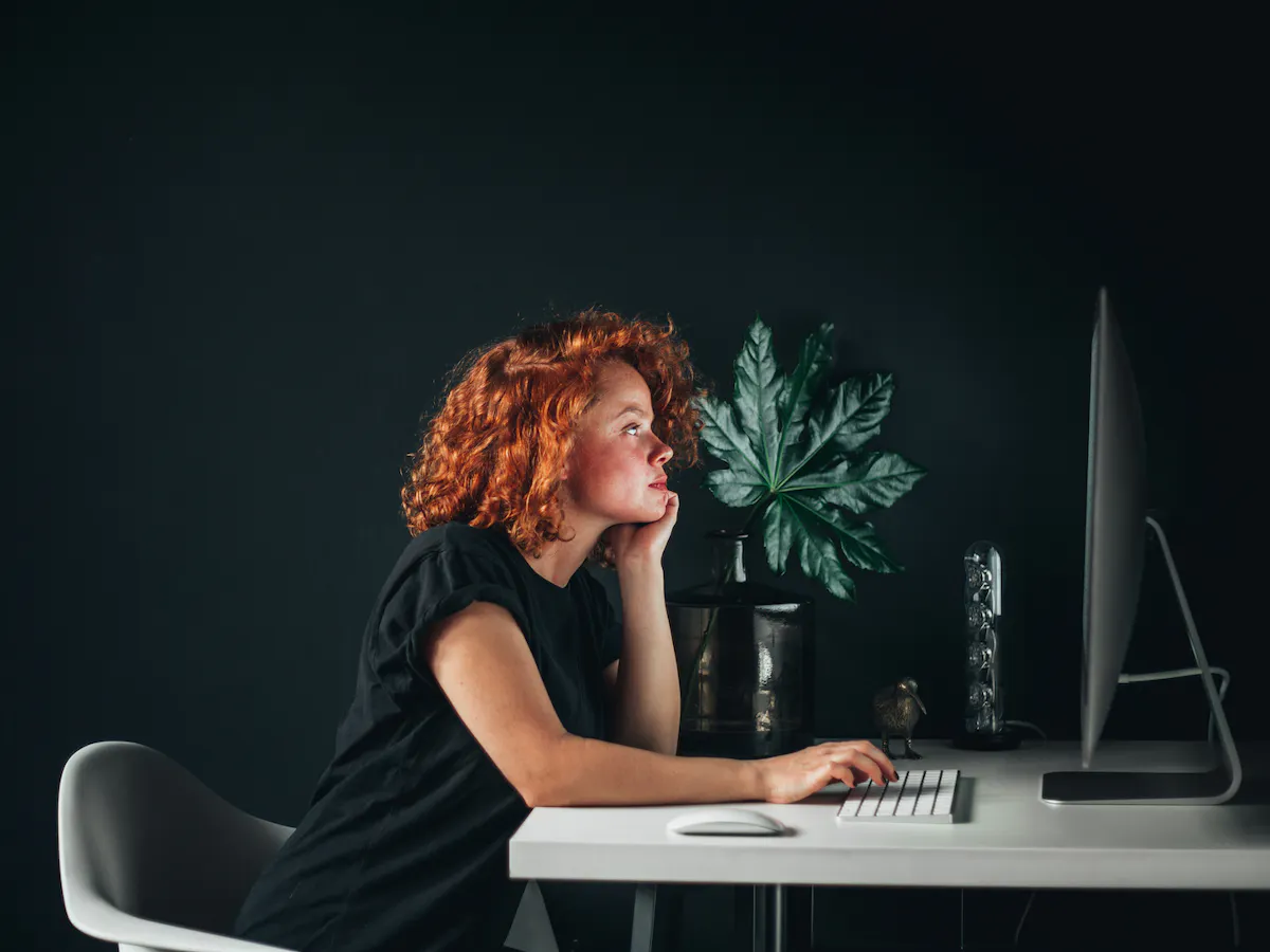 Woman at home working at desktop