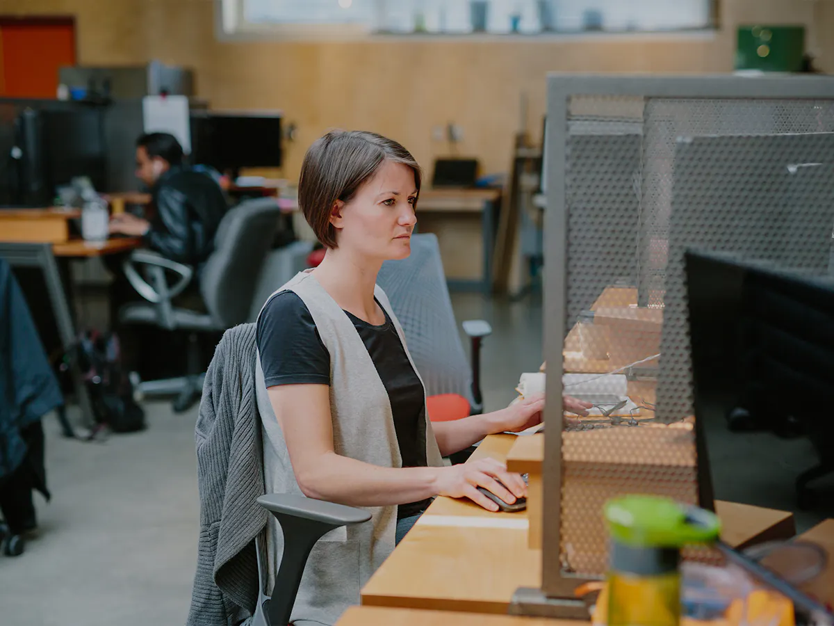 Woman focused at desk