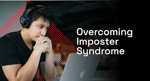 Man working on laptop - overcoming imposter syndrome