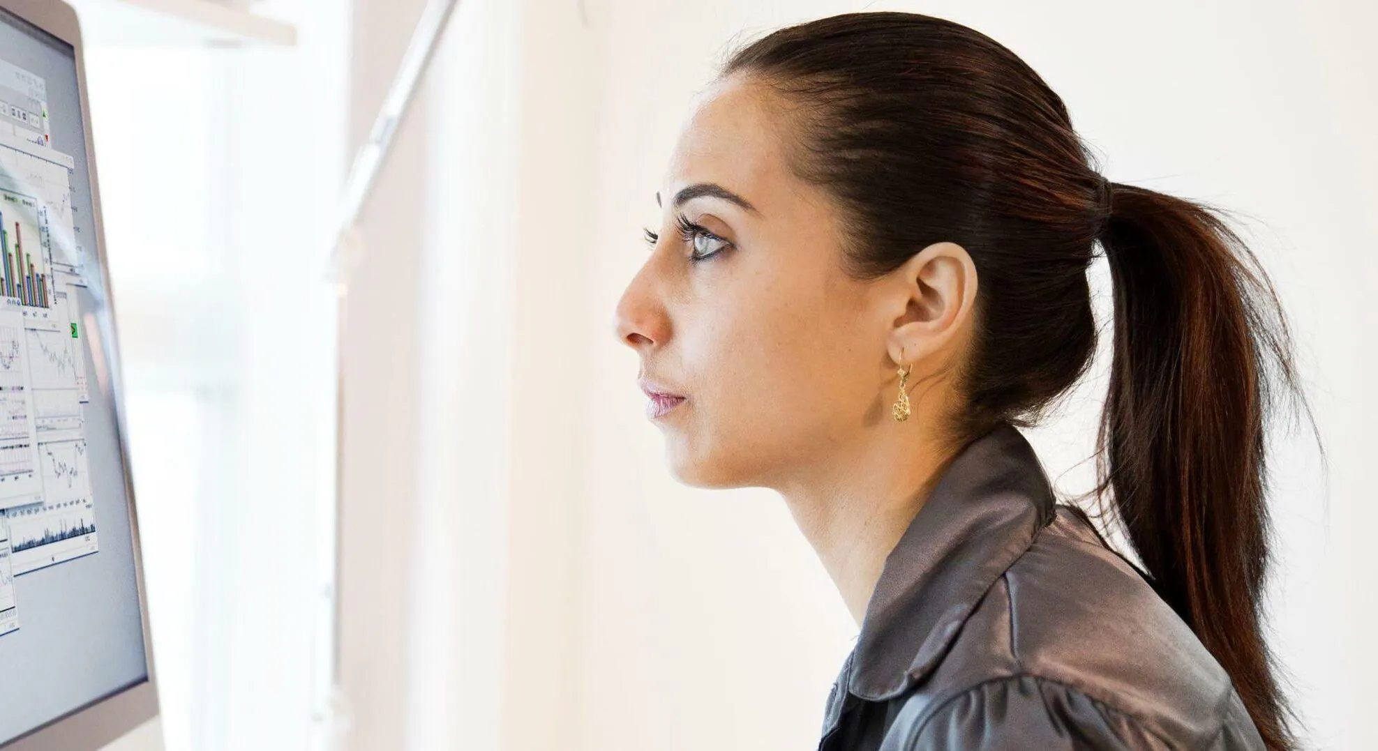 Woman looking at data card