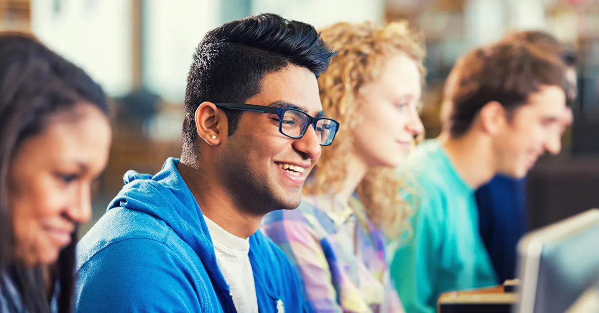 Guy smiling glasses wide