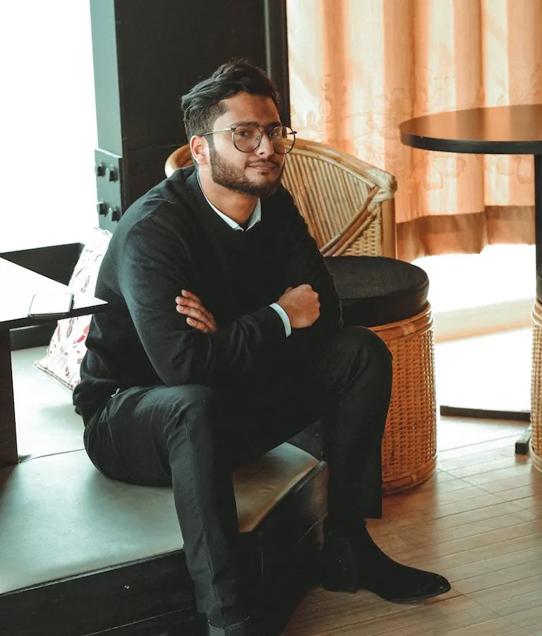 Man sitting casually in office space