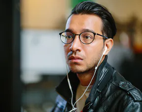 Man with glasses and headphones