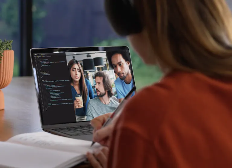 Woman getting code review from team members